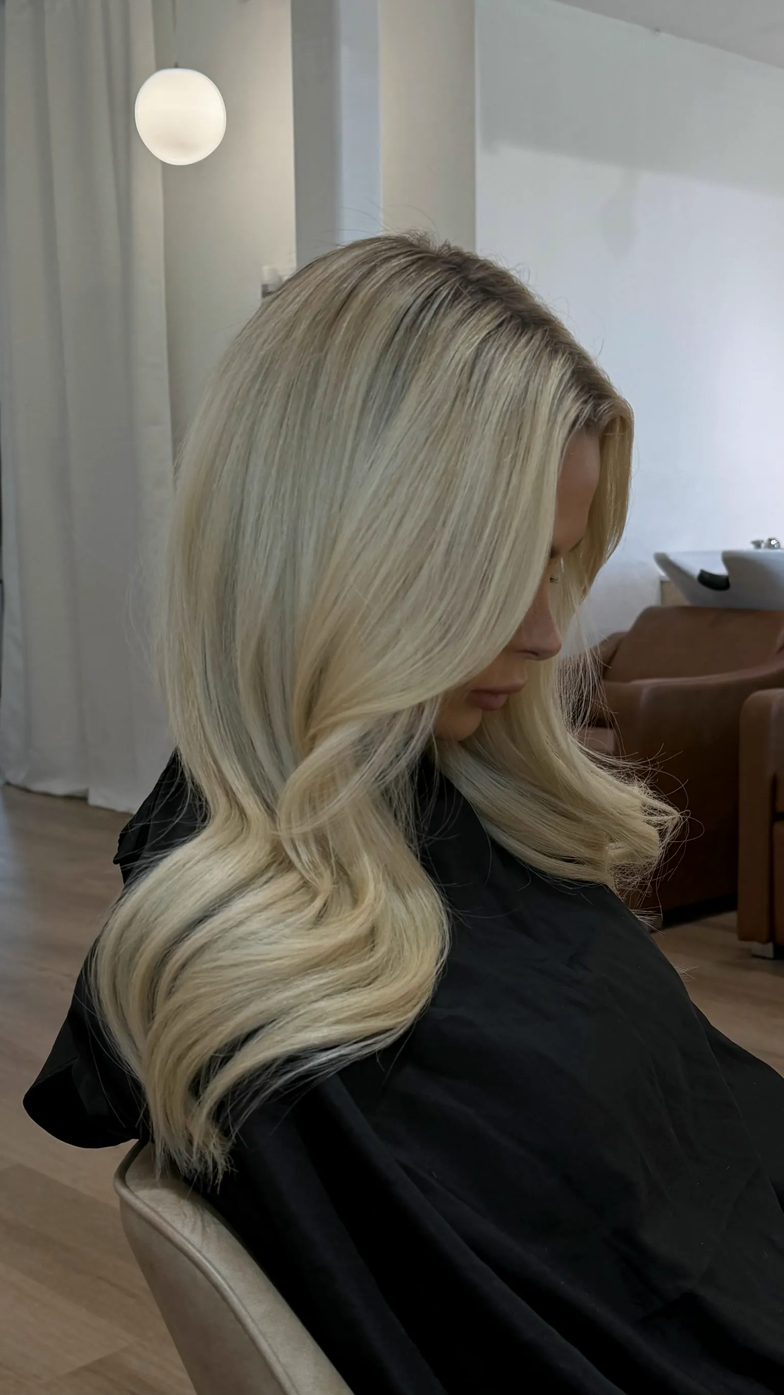 Bright blonde with a clean, sleek finish